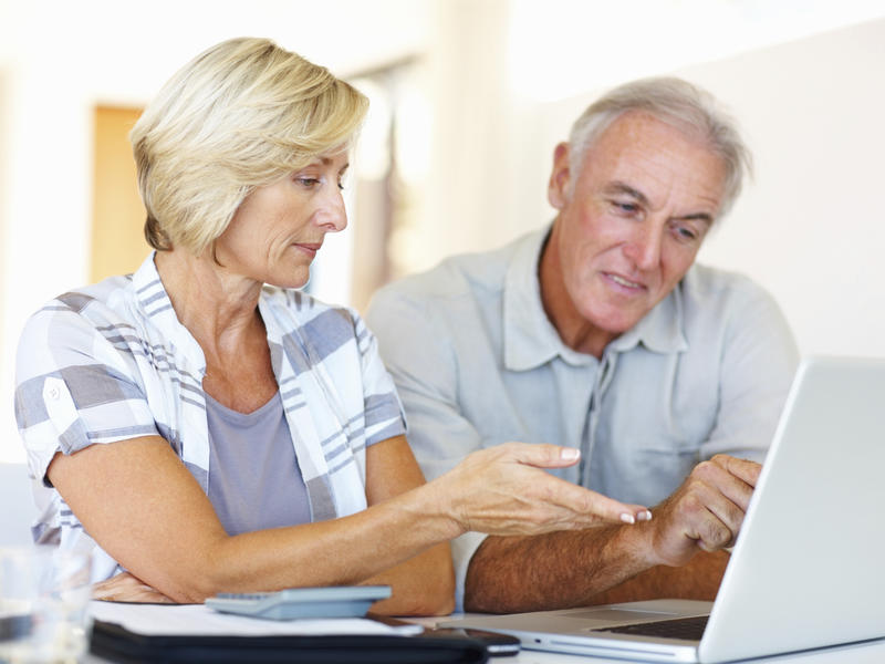 Couple looking at laptop